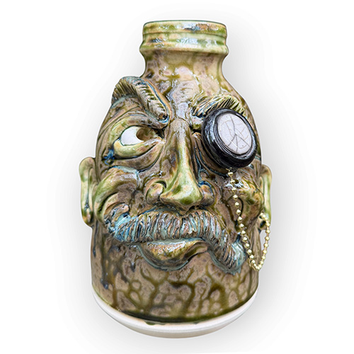 Robin Rodgers 7" Raised-Eyebrow Face Jug with Raku Monocle DP6575